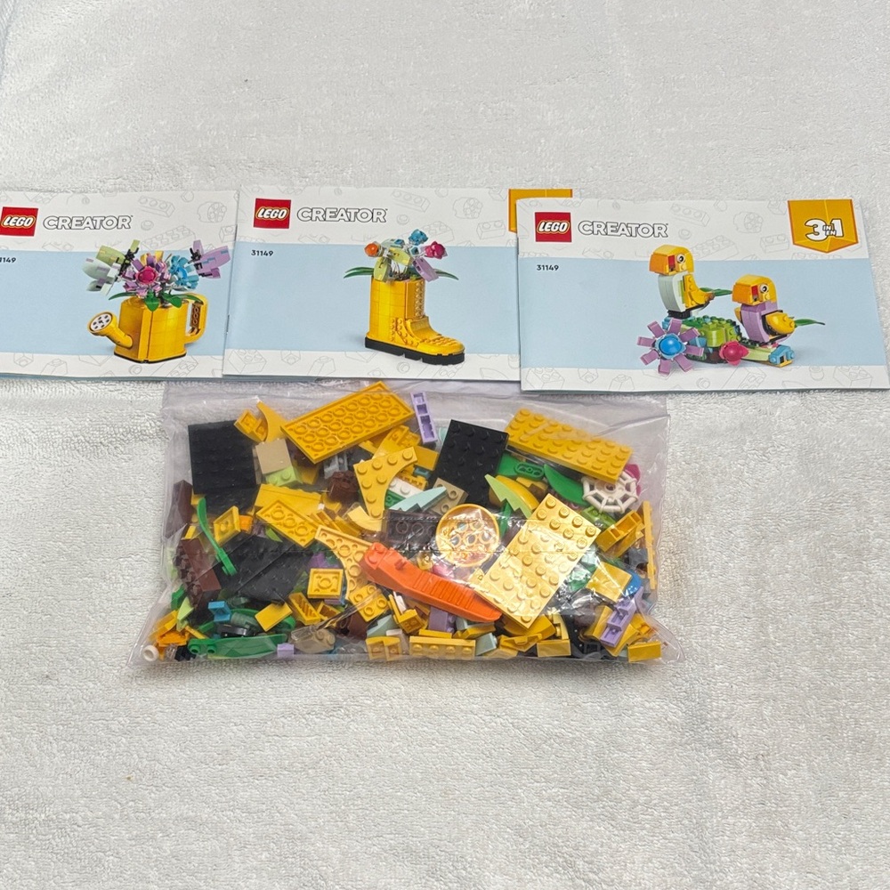 LEGO Creator 3-in-1 Set with Yellow, Black, and Green Bricks